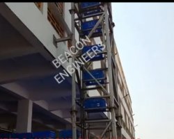 Vertical lifter conveyor