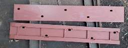 SKID BAR FOR TRAVELING GRATE STOKER