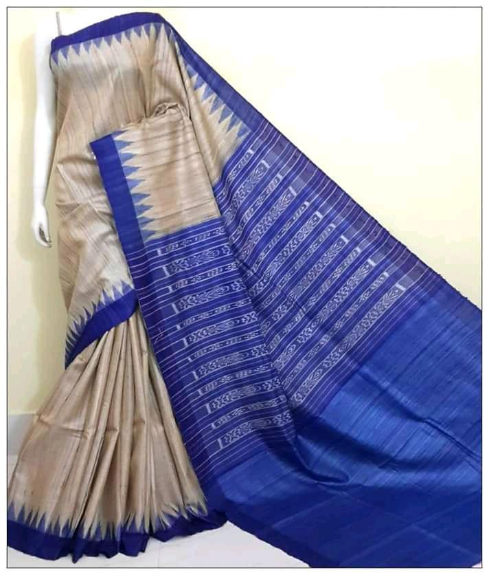 PURE TUSSAR GHICHA SILK TEMPLE BORDER SAREE WITH IKKAT WOVEN PALLU .