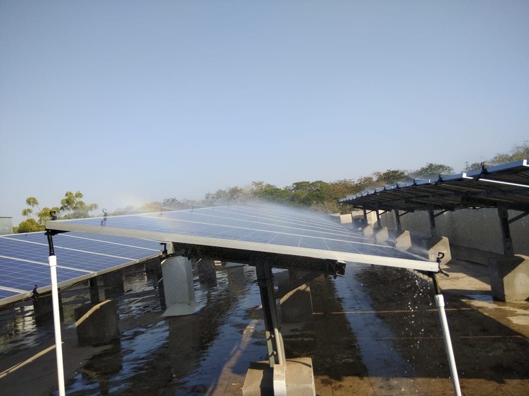 Micro-Sprinkler based automated Solar Module Cleaning System