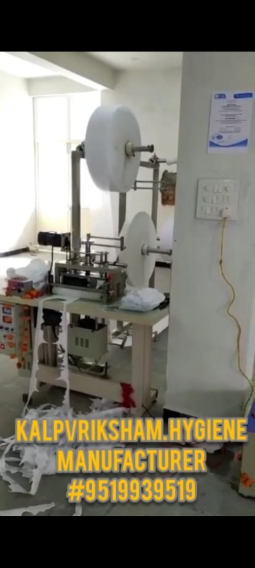 SANITARY NAPKIN MAKING MACHINE 