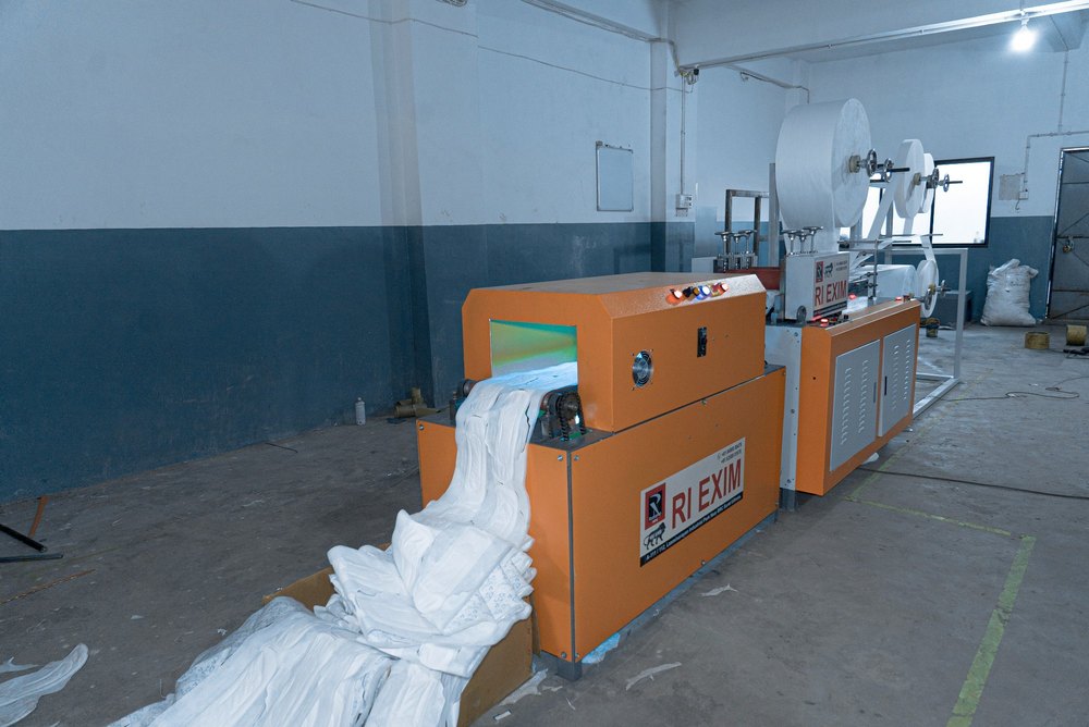 SANITARY PAD MAKING MACHINE